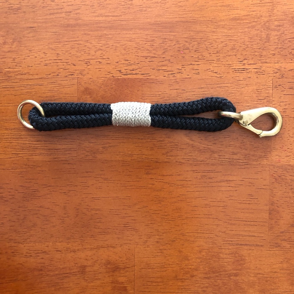 Rope bracelet with large brass clasp, black